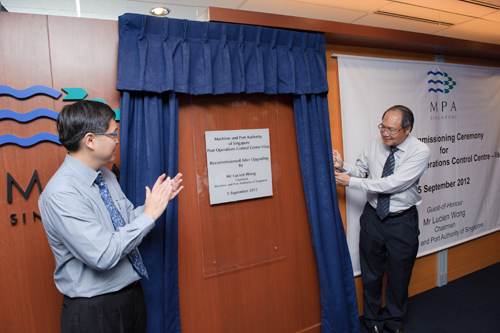 Unveiling the plaque at the re-commissioning ceremony