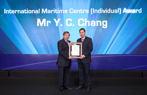 Mr S.S Teo receiving the award on behalf of Mr Y.C. Chang