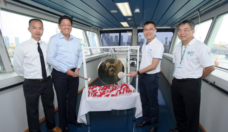 MPA Chief Executive, Mr Andrew Tan, and NOL Group President and CEO, Mr Ng Yat Chung, striking a Gong on Singapore-registered APL Phoenix to signify safety first practices observed onboard
