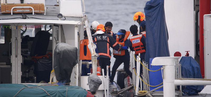 Passengers being rescued from the ferry